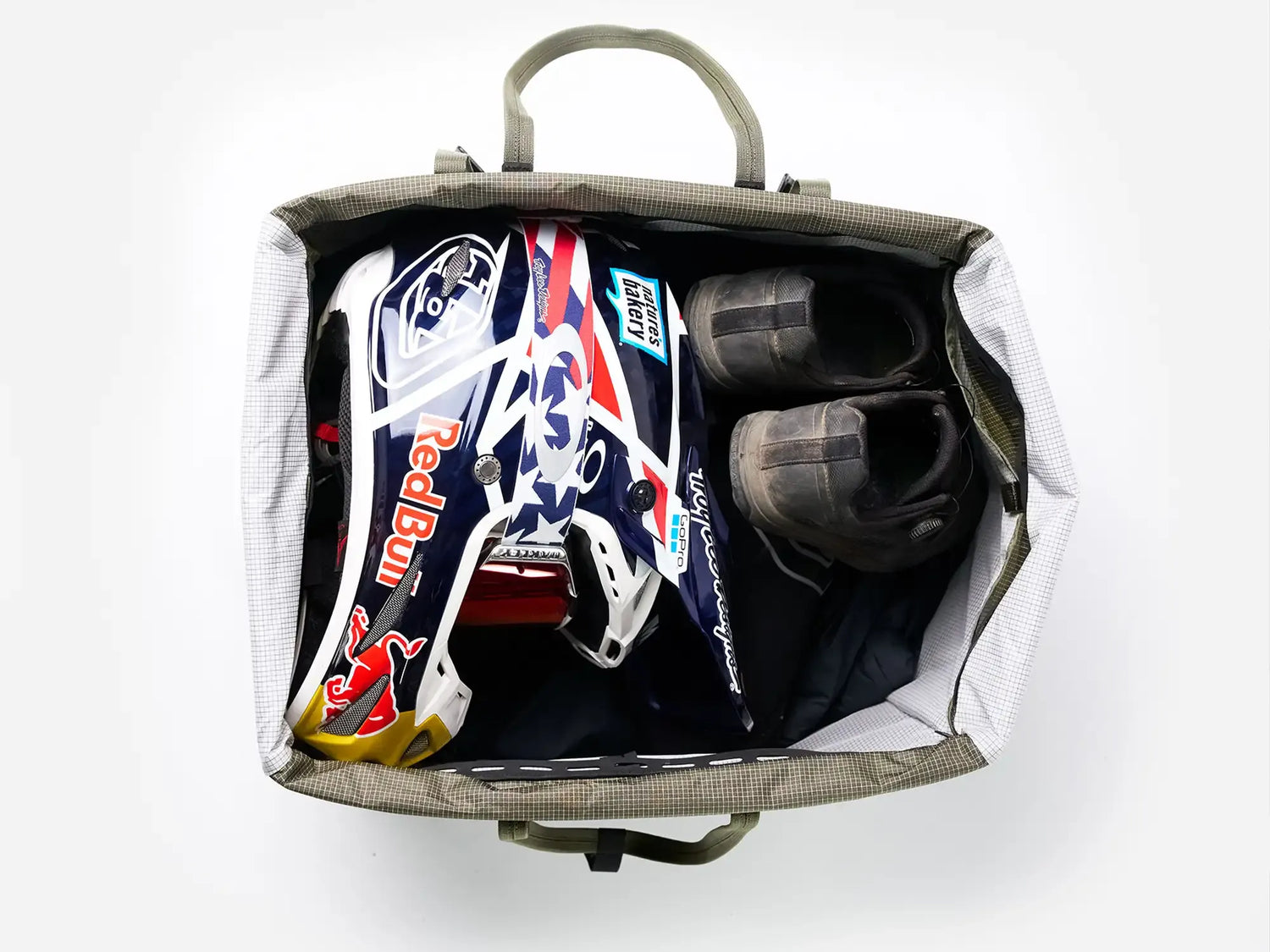 Rux 55L showing sports gear in the bag.
