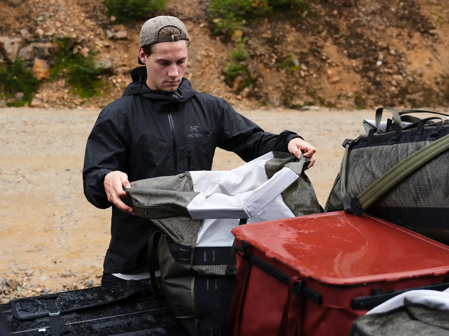 Rux 55L Duffel box being opened on truck bed.