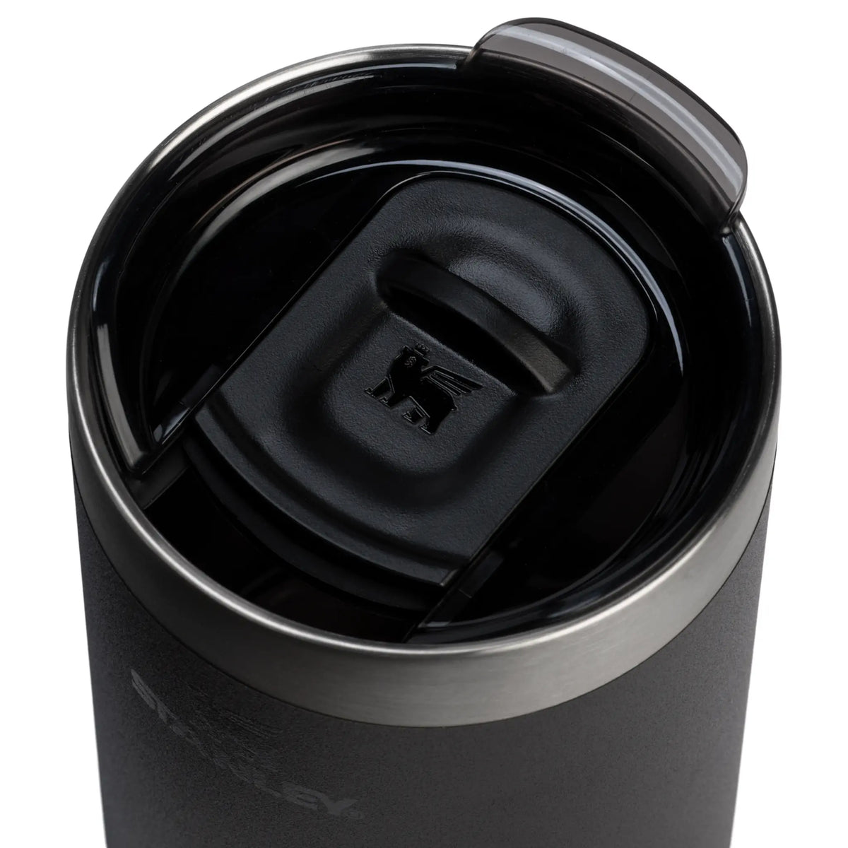 Close-up of the Stanley Everyday Camp Cup’s slide-open drink lid with embossed bear logo