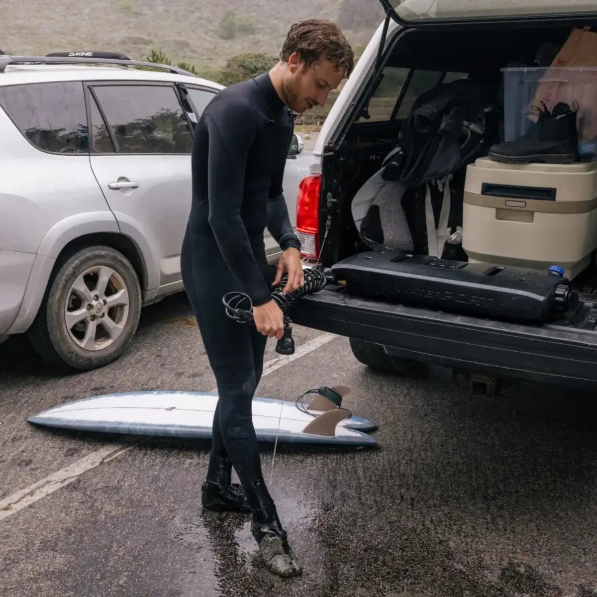 Using WaterPORT Overlander tank to rinse off after surfing