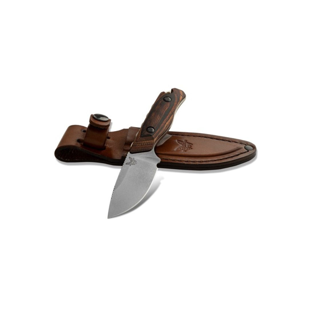 Benchmade Hidden Canyon Hunter knife with leather sheath displayed.