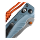 Close-up of Benchmade Mini Adira depth blue handle texture with AXIS lock and orange lanyard detail