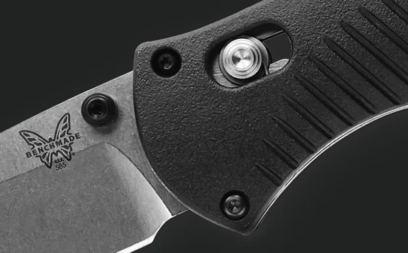 Benchmade Mini Barrage 585 AXIS assist lock detail showing mechanism and textured handle