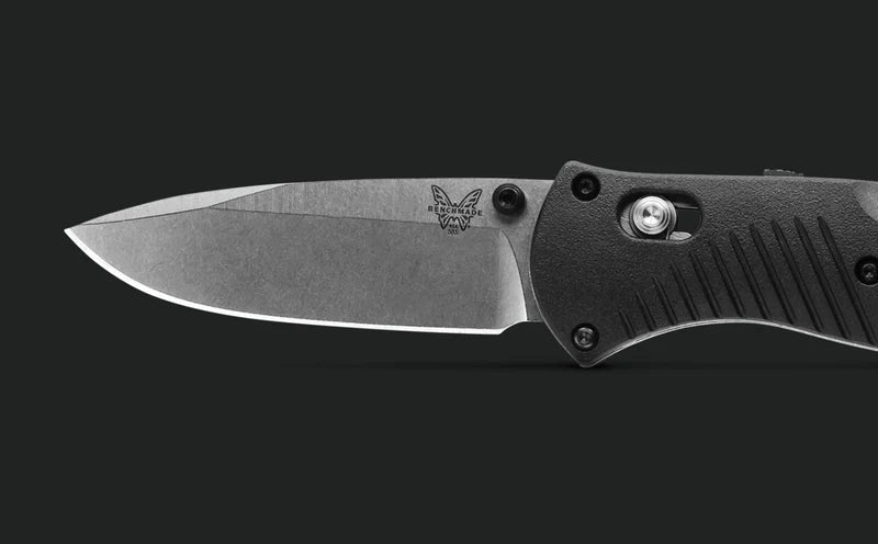 Benchmade Mini Barrage 585 folding knife blade side profile close-up showing drop-point shape and stonewashed finish