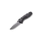 Benchmade Mini Barrage 585 folding knife open angled view showing drop-point blade and handle texture