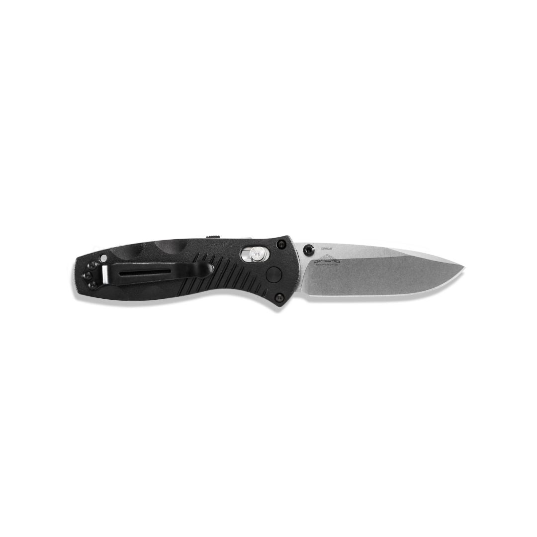 Benchmade Mini Barrage 585 folding knife open clip side view with pocket clip and handle texture