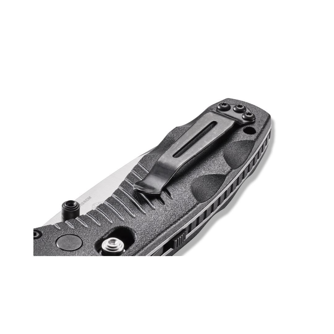 Benchmade Mini Barrage 585 pocket clip detail showing mounting hardware and textured handle