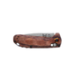 Benchmade North Fork drop-point knife closed view showing stabilized wood handle texture