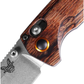 Benchmade North Fork drop-point knife close-up of pivot and stabilized wood handle detail