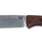 Benchmade Saddle Mountain Skinner blade close-up with Benchmade logo and edge detail.
