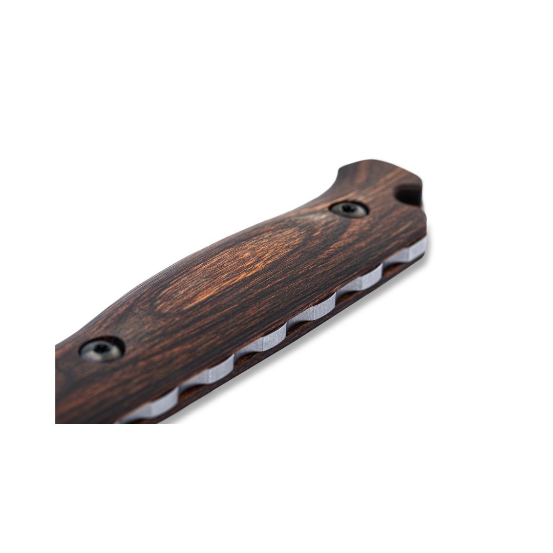 Benchmade Saddle Mountain Skinner handle close-up showing wood grain texture.