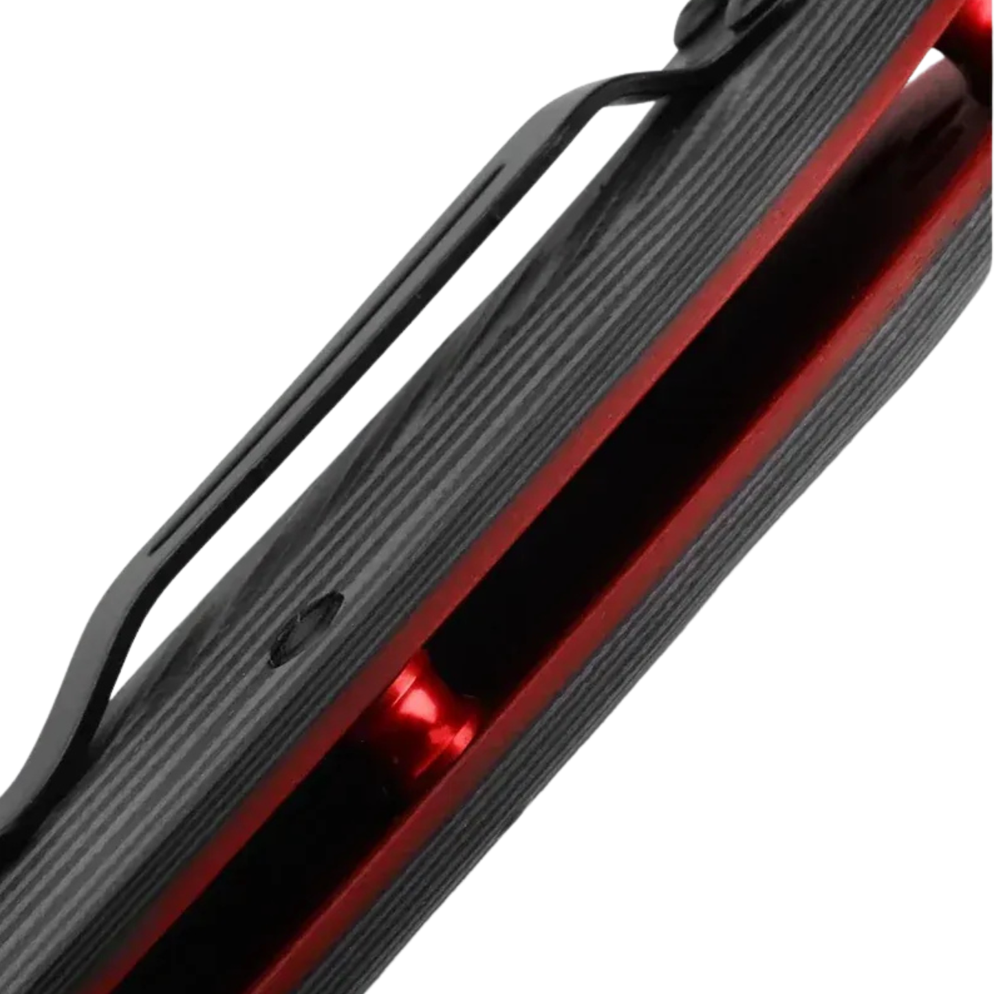 Benchmade Super Freek drop-point knife close-up of handle with red liner and pocket clip