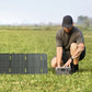 EcoFlow 45W solar panel in a field being used outdoors for portable charging.