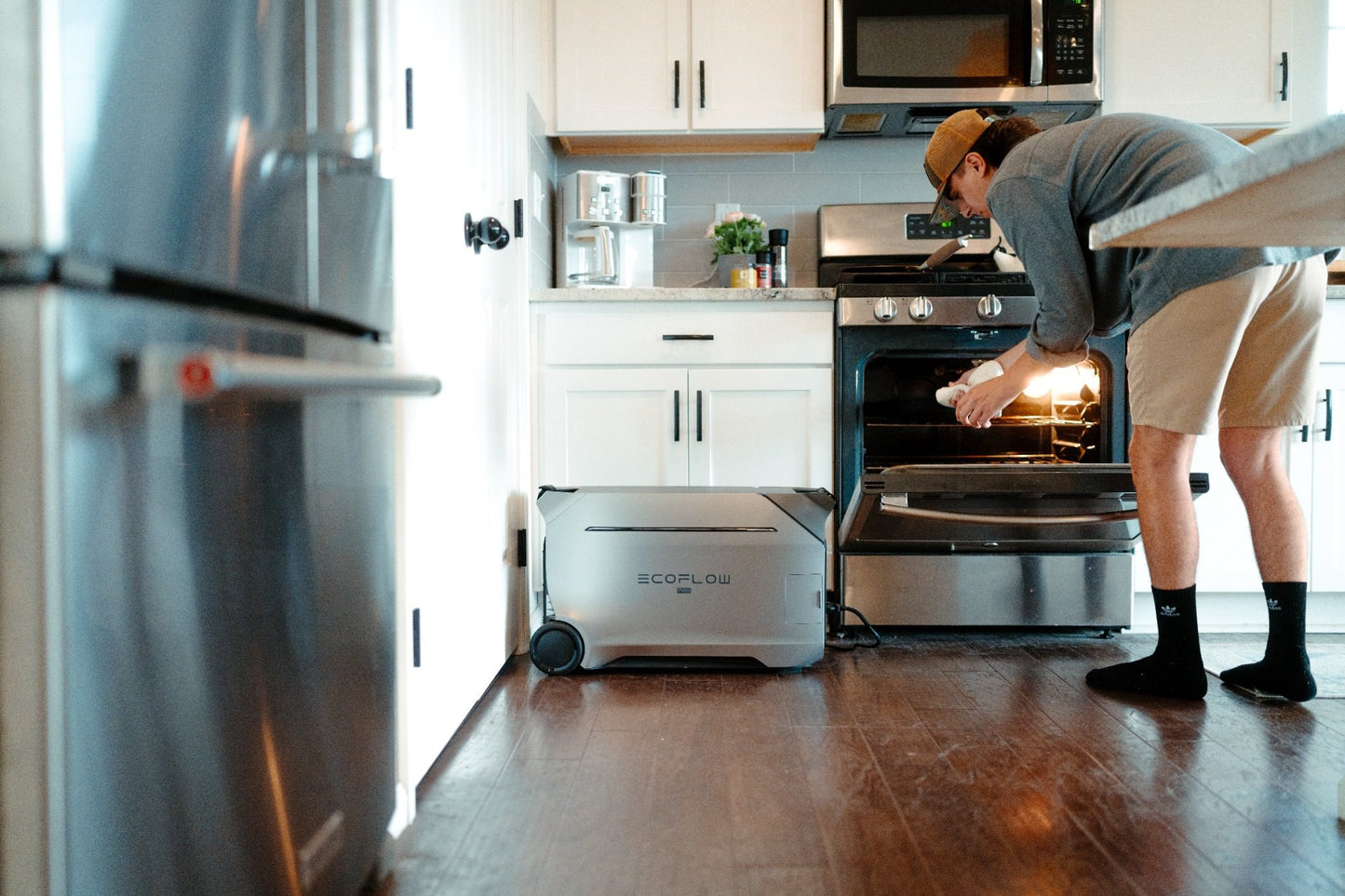 EcoFlow Delta Pro 3 in a lifestyle kitchen oven left side view setting powering home an electric oven.