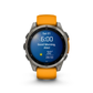 Garmin fēnix 8 47mm AMOLED GPS watch titanium with spark orange band showing morning report weather and time display