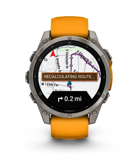 Garmin Fenix 8 smartwatch displaying GPS map with navigation route and distance