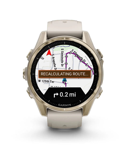 Garmin Fenix 8 smartwatch displaying GPS map with navigation route and distance
