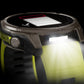 Garmin fēnix 8 Solar watch with built-in LED flashlight illuminated on titanium case