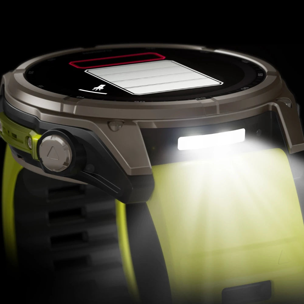 Garmin fēnix 8 Solar watch with built-in LED flashlight illuminated on titanium case