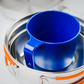 GSI Outdoors Glacier stainless mess kit with blue camping cup nested inside pot for compact storage