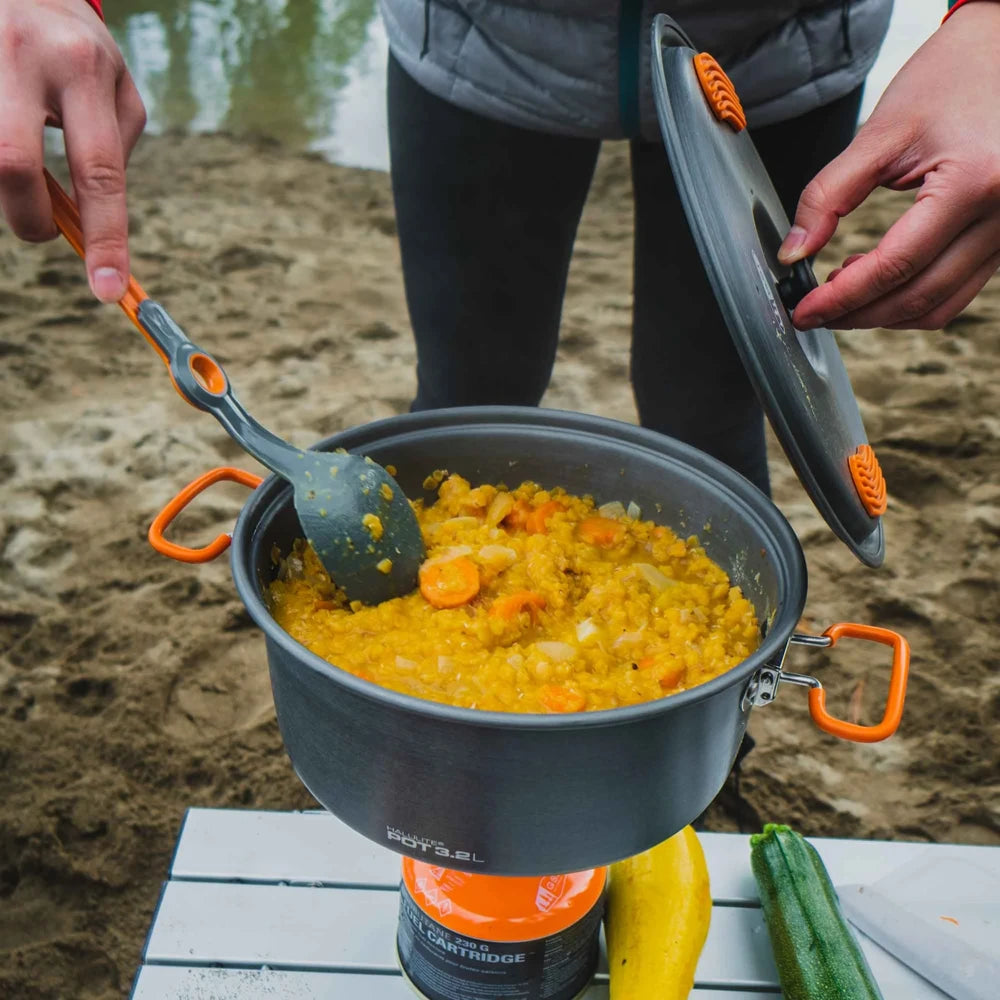 GSI Outdoors Halulite 4.7L camping cooking pot in outdoor use preparing food on portable stove