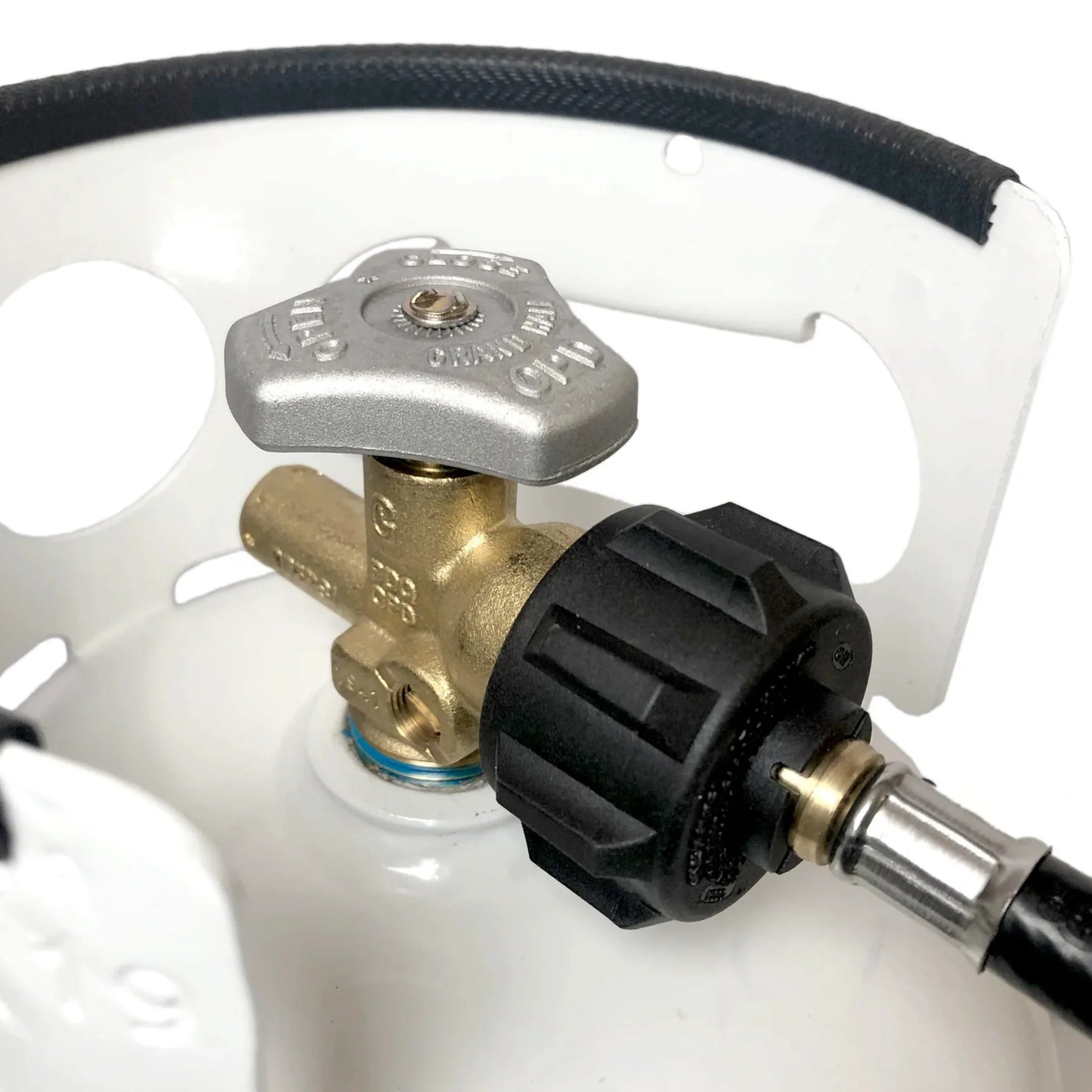 Ignik Adapter Hose connected to propane tank valve for camping stove use