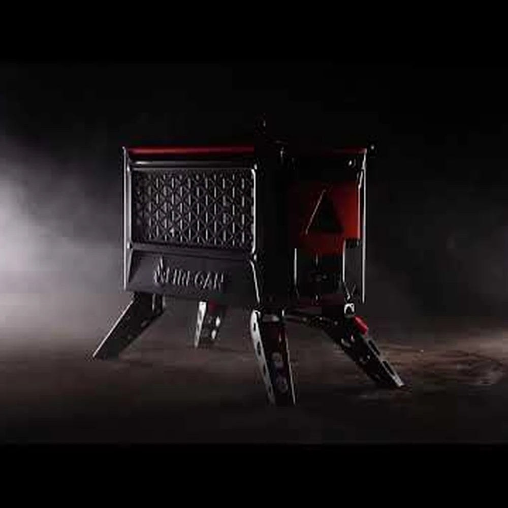 Ignik Elite FireCan portable propane fire pit in dramatic studio lighting with smoke background