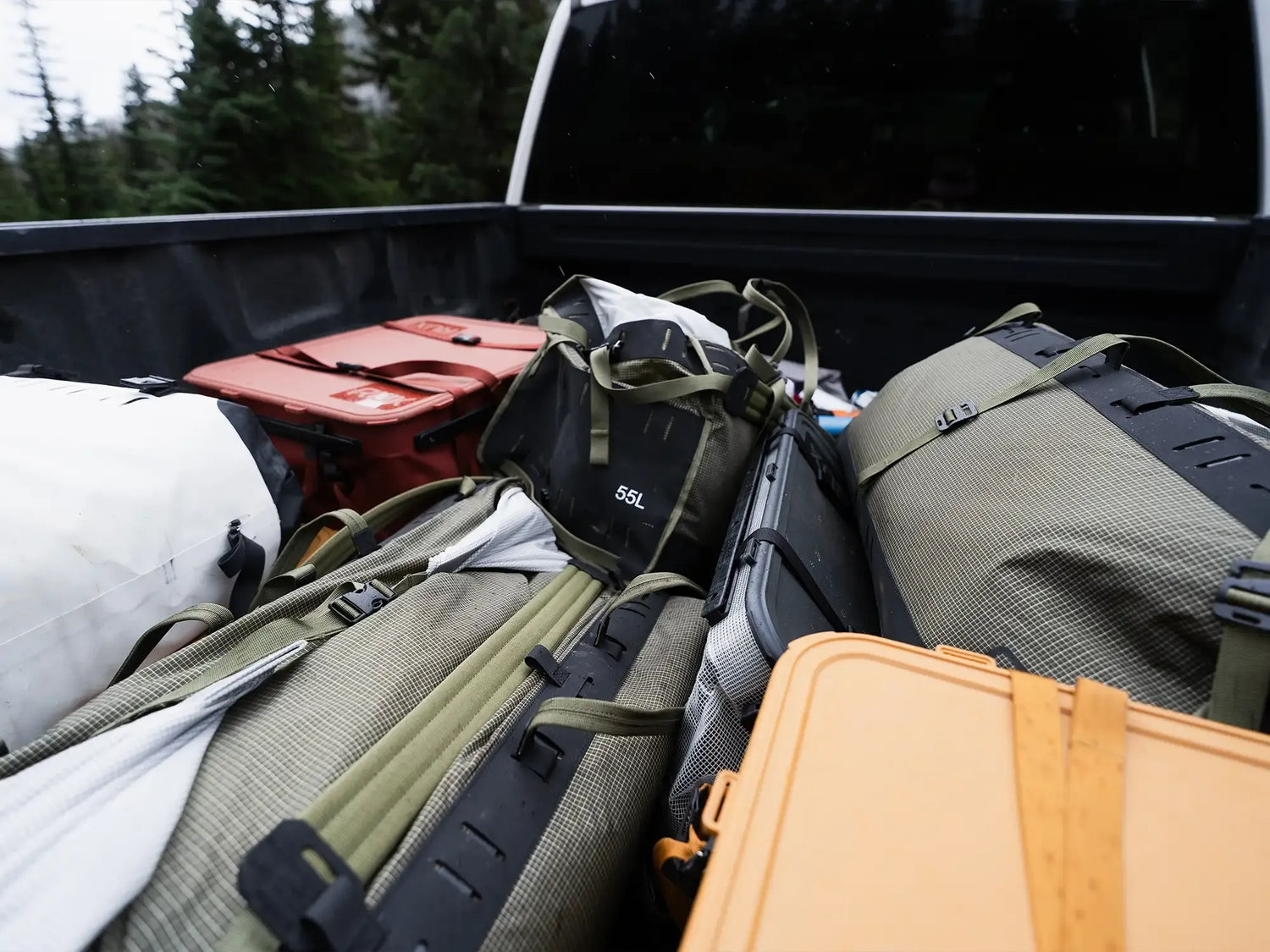 Rux 55L in bed of truck in bad weather. 