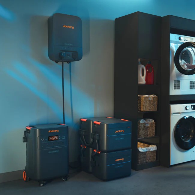 Jackery Battery Pack 5000 Plus units stacked in a laundry room for whole-home backup.