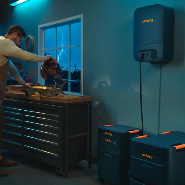 Jackery Battery Pack 5000 Plus connected in a workshop during a power outage.