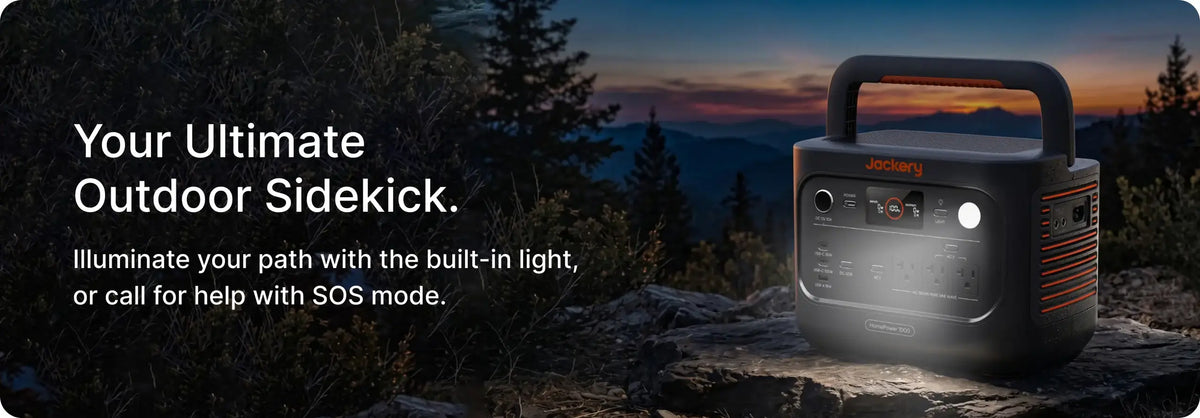 Jackery HomePower 1000 v2 on a rocky ridge at dusk with its built-in LED light illuminating the ground