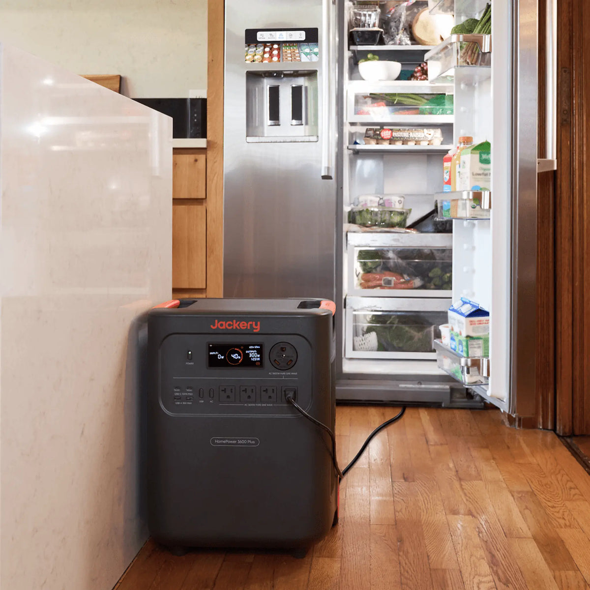Jackery HomePower 3600 Plus powering a refrigerator in a home kitchen