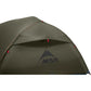 Detail of MSR Hubba Hubba HD 2 tent rainfly kickstand vent and MSR logo on olive green 20D ripstop nylon fly with guy line attachment point
