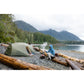 MSR Hubba Hubba HD 2-Person Backpacking Tent pitched at scenic Pacific Northwest lakeside campsite with mountain and forest backdrop on Vancouver Island