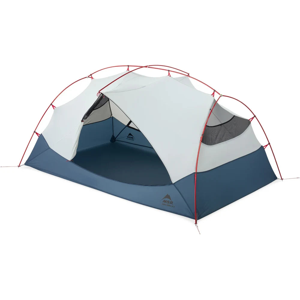 MSR Hubba Hubba HD 2-Person Tent with vestibule door open showing generous side-entry access, blue floor panel, and StayDry rain gutters