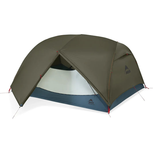 MSR Hubba Hubba HD 3-Person Tent fully pitched with olive green rainfly and side vestibule door open revealing spacious interior and blue floor
