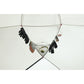 Interior clothesline of MSR Hubba Hubba HD 3 tent with gloves, socks, headlamp and hat hanging to dry, demonstrating built-in gear drying and storage system