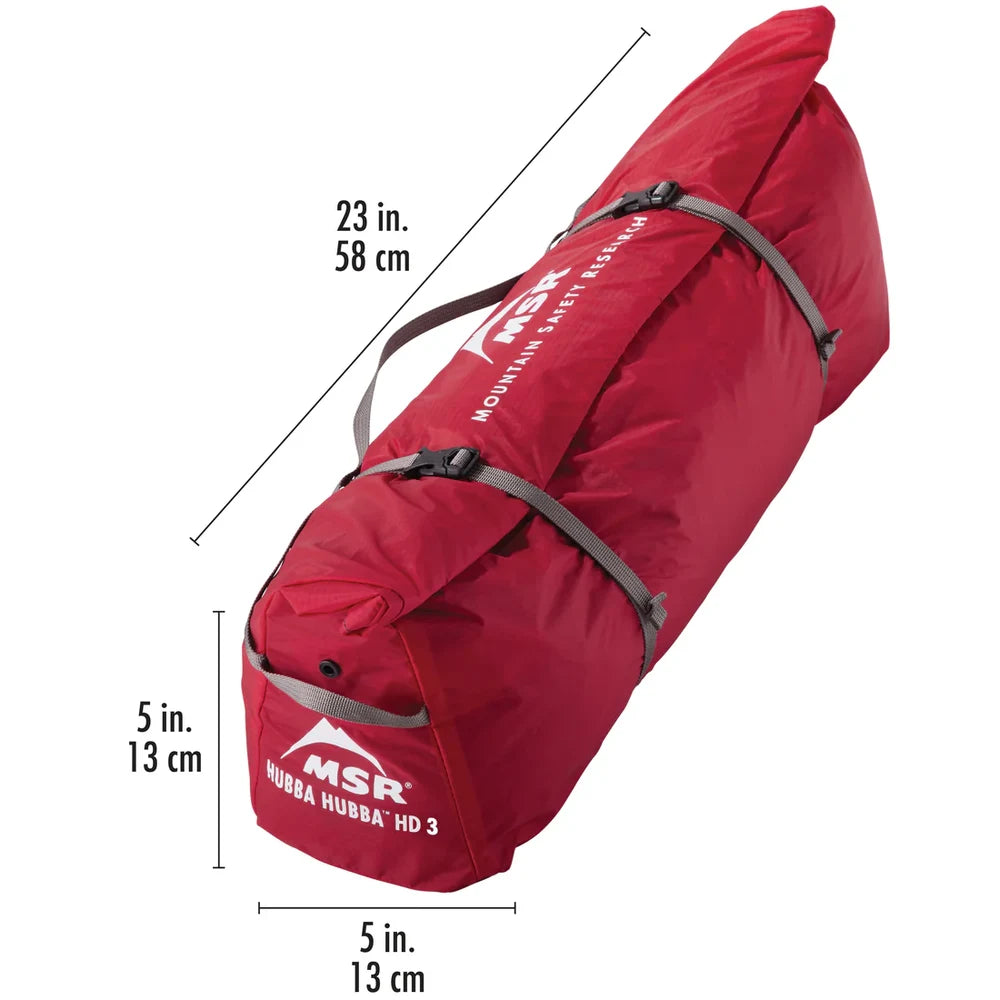 MSR Hubba Hubba HD 3 tent packed in red roll-top stuff sack with dimension callouts showing 23 x 5 inch packed size ideal for backpacking