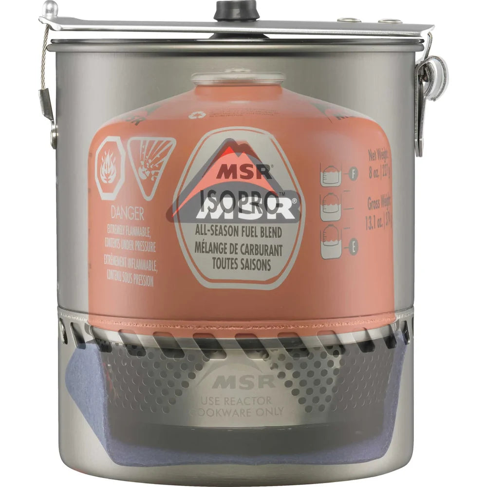 MSR Reactor 1.7L stove system cutaway x-ray view showing MSR IsoPro fuel canister and burner nested inside anodized aluminum pot for ultralight compact storage