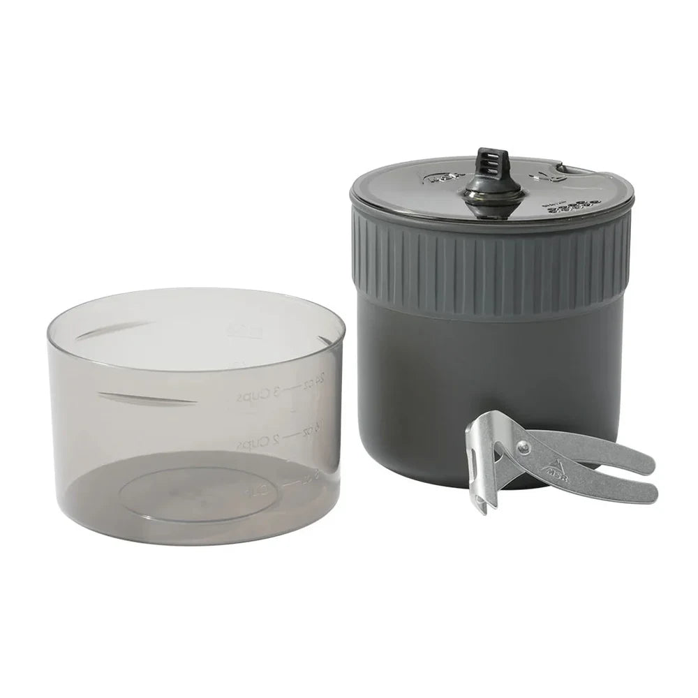 MSR Trail Mini Duo Cook Set on white background showing anodized aluminum pot with strainer lid, MSR folding pot lifter, and clear polycarbonate bowl with measurement markings