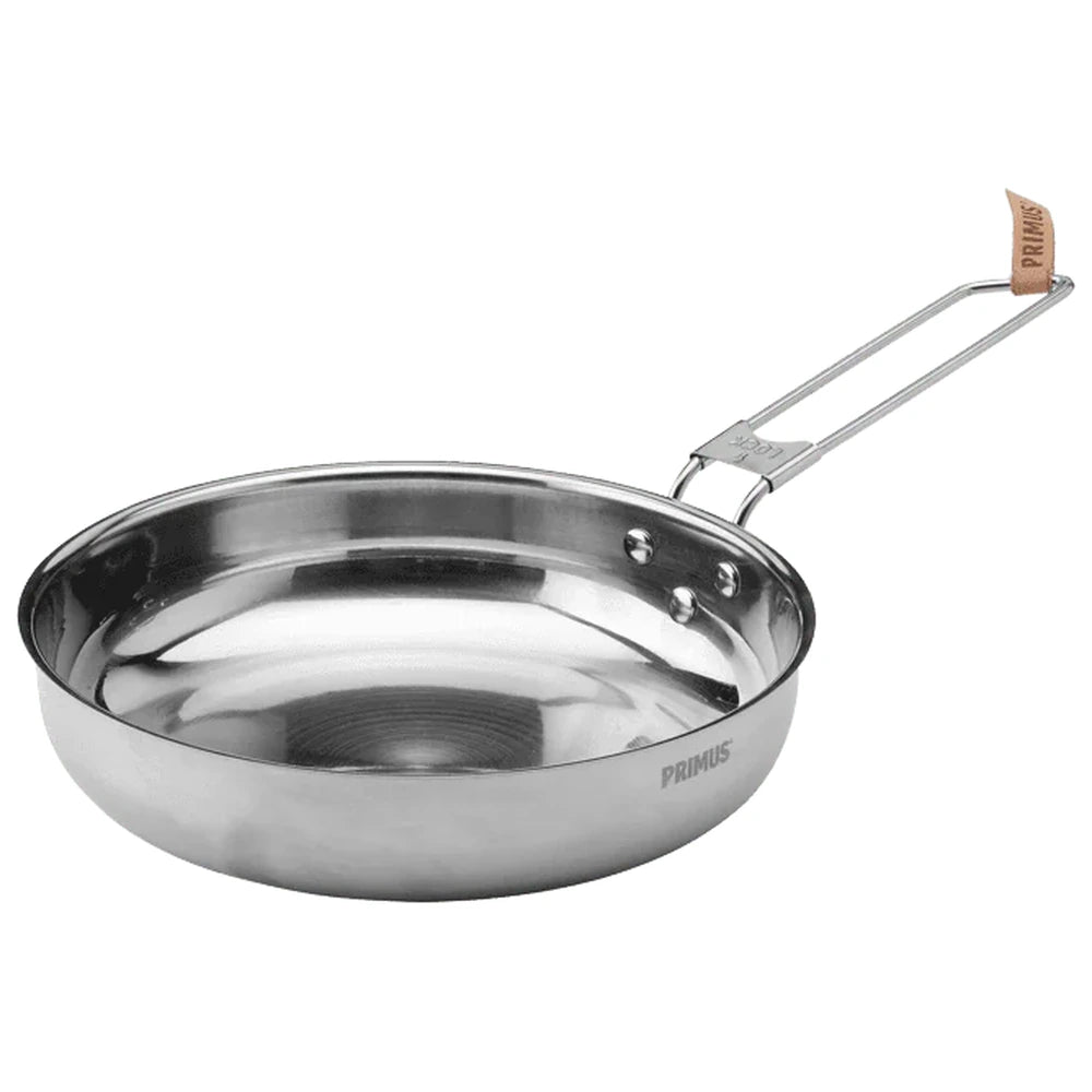 Primus stainless steel camping frying pan with folding handle on white background