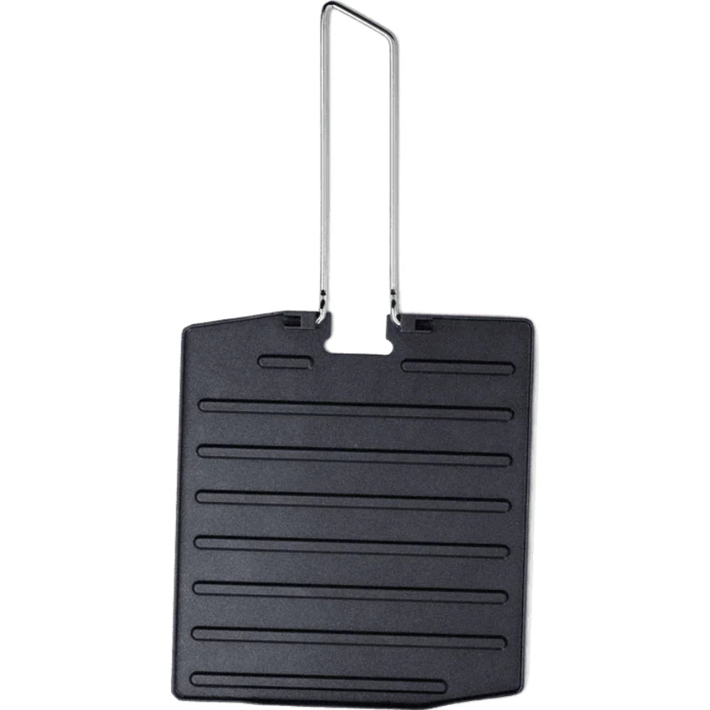 Primus griddle plate upright view showing folding handle and ridged cooking surface