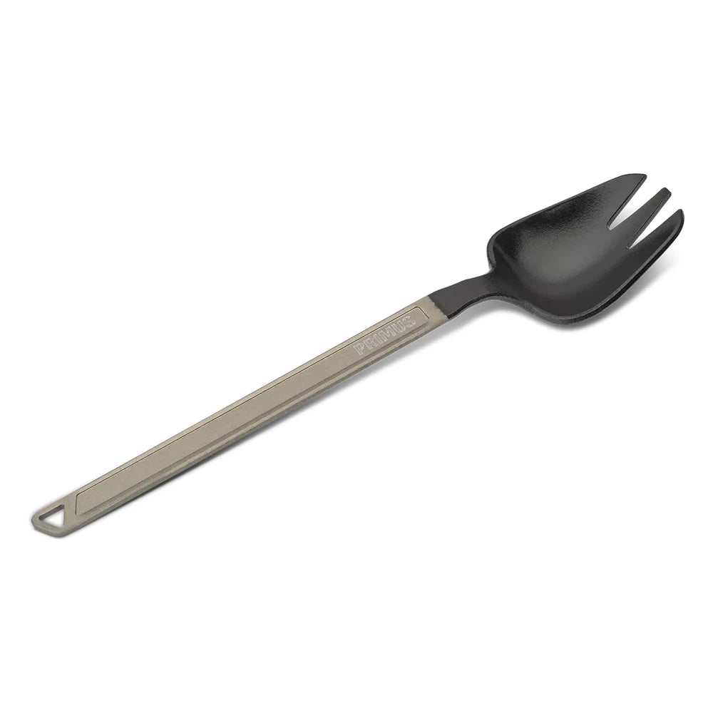 Primus Trekking Spork on white background showing full length diagonal view with anodized aluminum handle engraved with Primus logo and black nylon spork head with fork tines