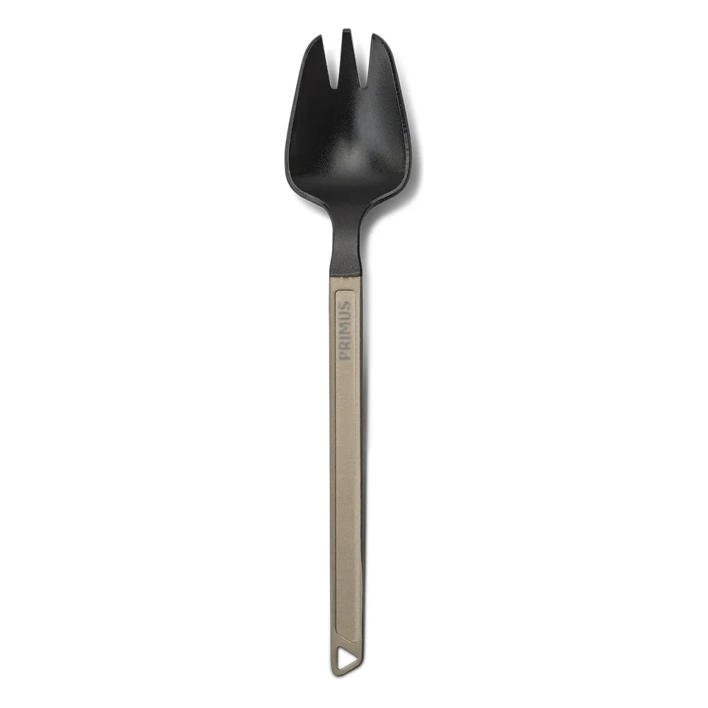 Primus Trekking Spork vertical front view on white background showing full length of anodized aluminum handle with Primus branding and black nylon spork head