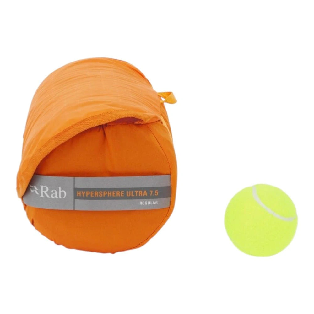 ab Hypersphere Ultra 7.5 sleeping mat packed in stuff sack next to tennis ball for size comparison