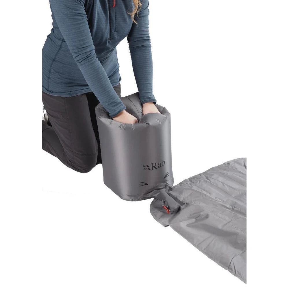 Rab Stratosphere 4 sleeping mat being inflated using included inflation bag