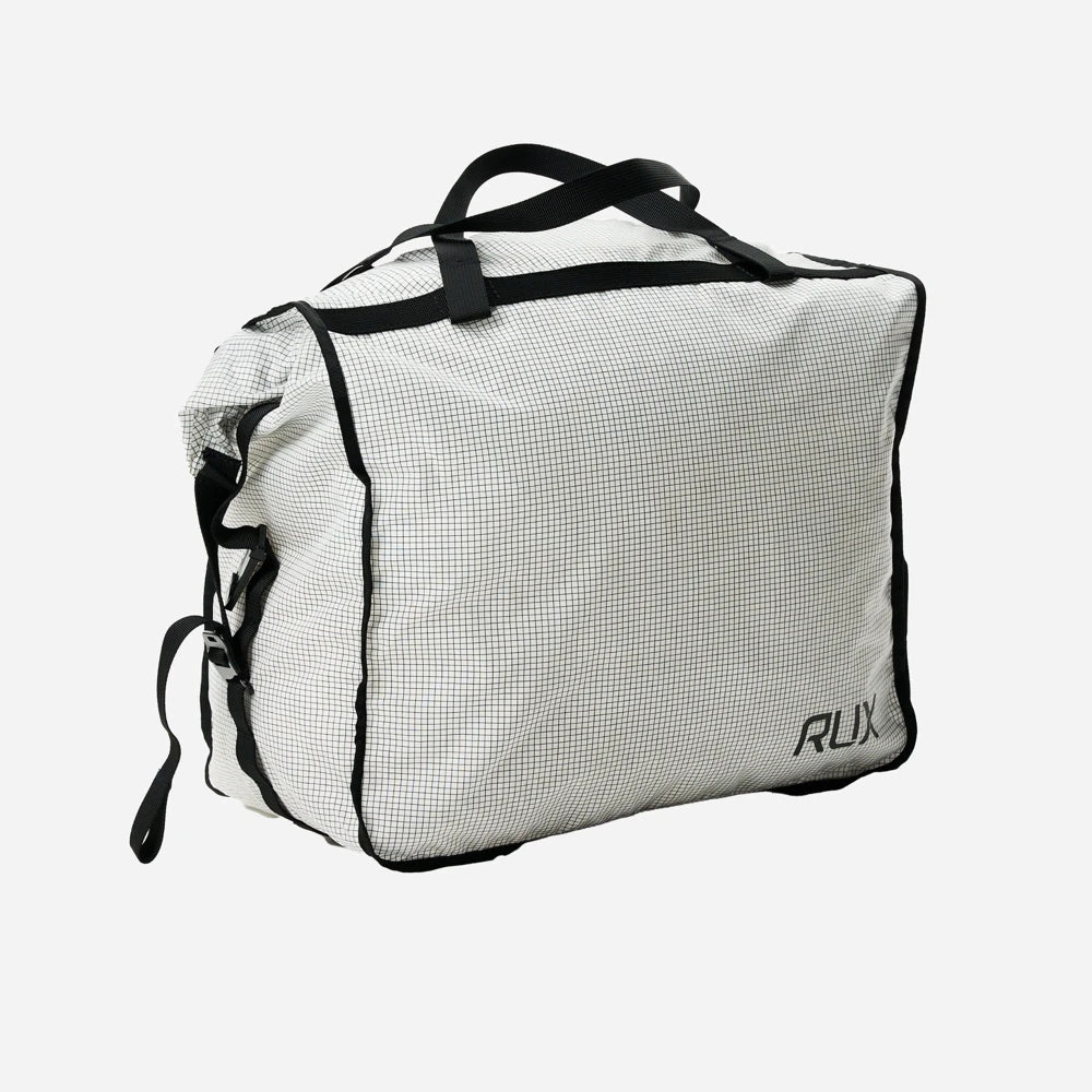 Rux 20L packing bag angled view highlighting flexible cube design and durable material