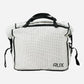 Rux 20L packing bag front view showing structured lightweight gear storage with durable handles