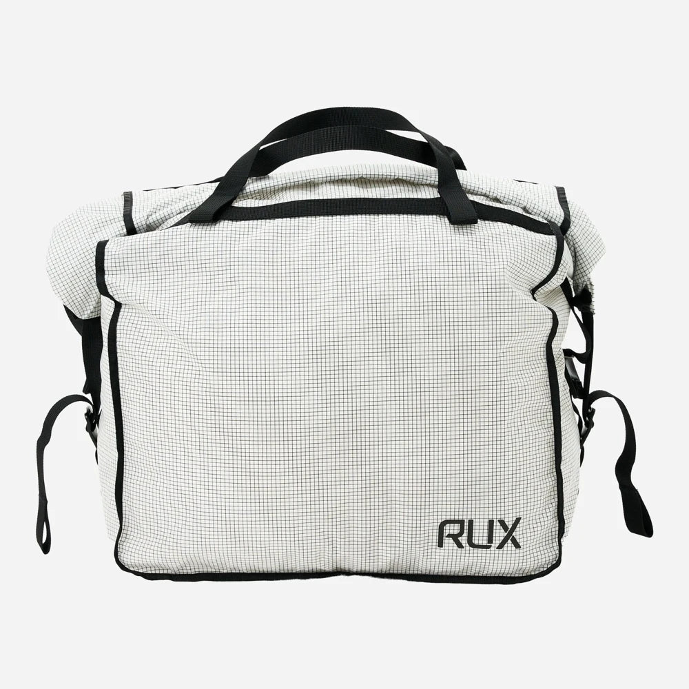 Rux 20L packing bag front view showing structured lightweight gear storage with durable handles