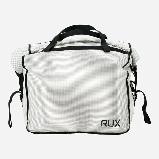 Rux 20L packing bag front view showing structured lightweight gear storage with durable handles
